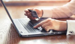 person online shopping using a credit card