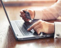 person online shopping using a credit card
