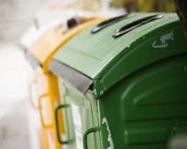 assortment of commercial waste bins
